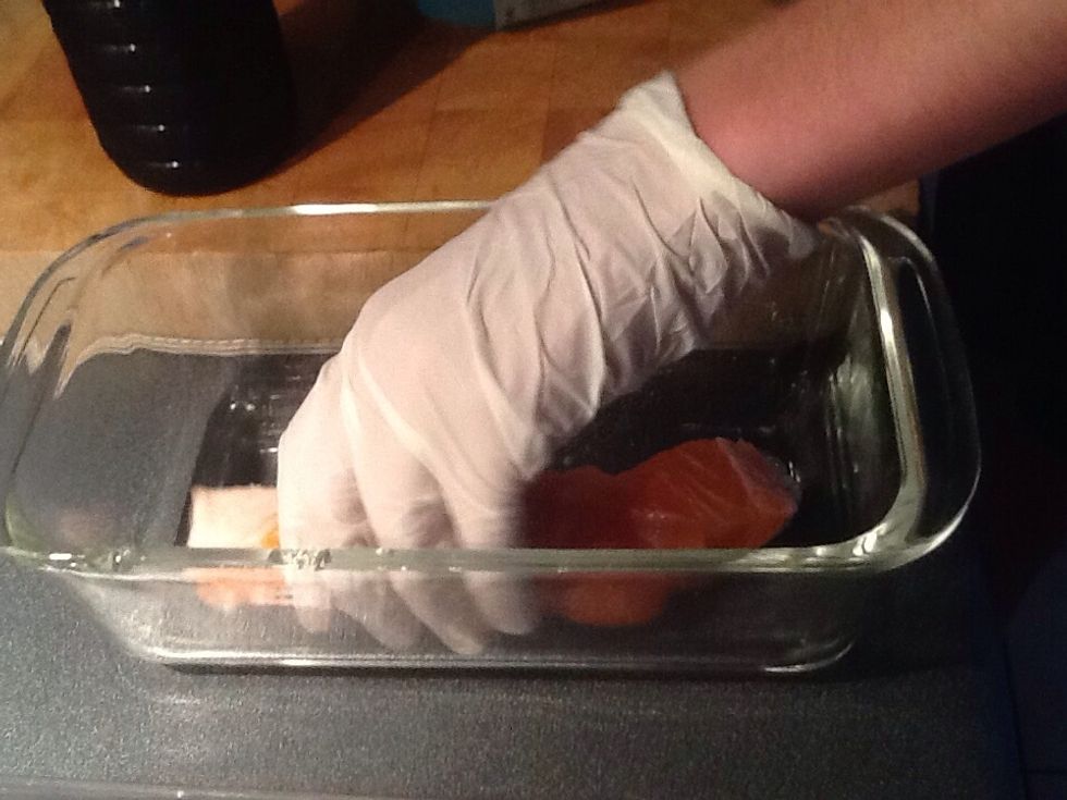 First you need to place the salmon in a bowl of some kind. Make sure you place them in so that they are next to each other.