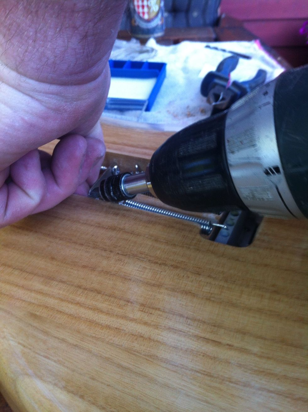 First you need to put the springs in right place of the bridge under the guitar