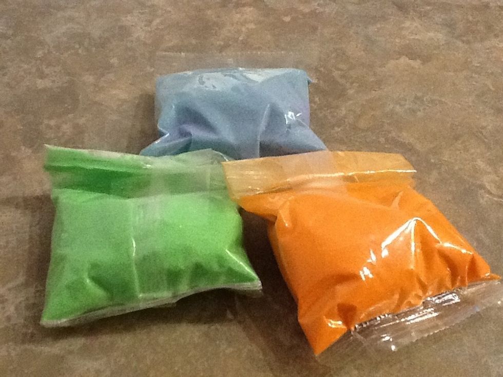 First you pick out what colors of sand you want to use.