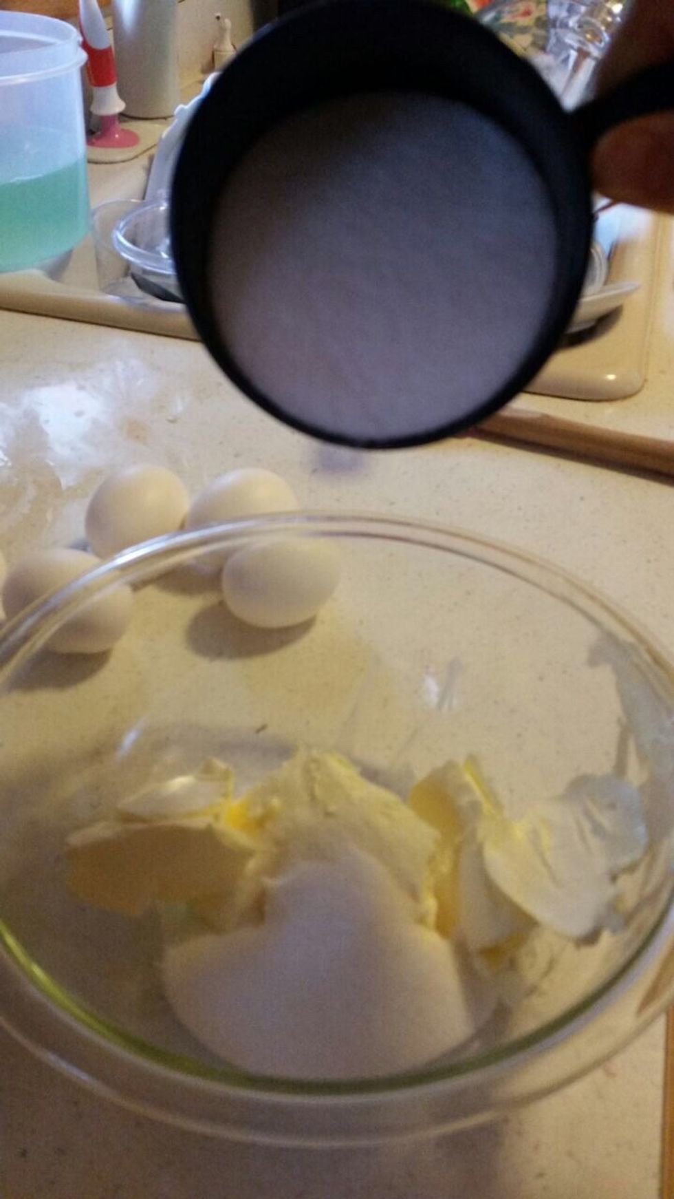 First you put a bar of butter in a medium sized bowl