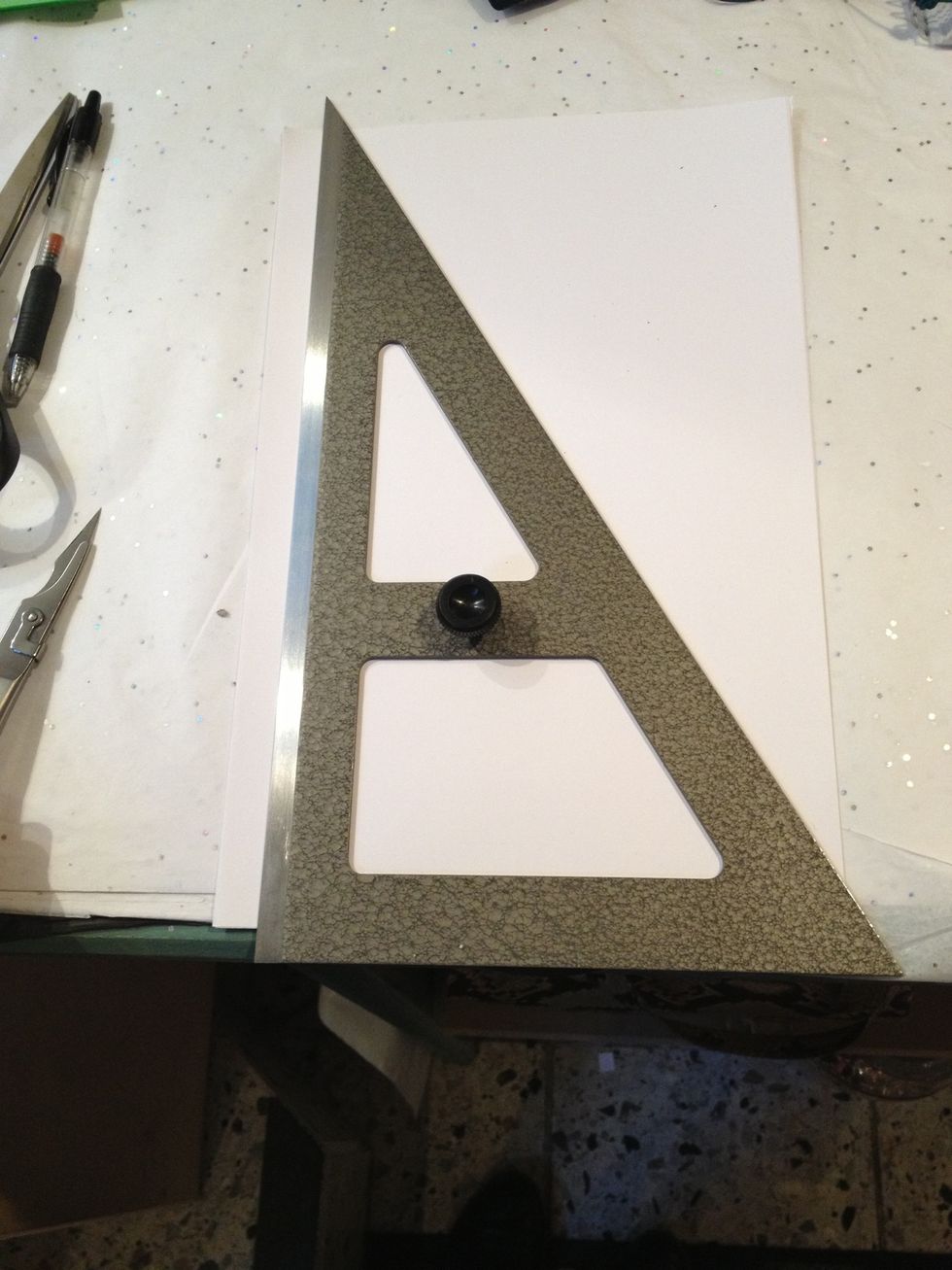 First you put up your ruler so it makes a long stripe