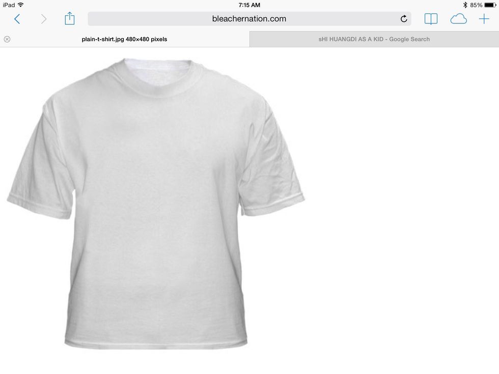 First, you start off with a blank white shirt that will be laid out on your table and make sure you put paper towels under the shirt the tie dye might seep through