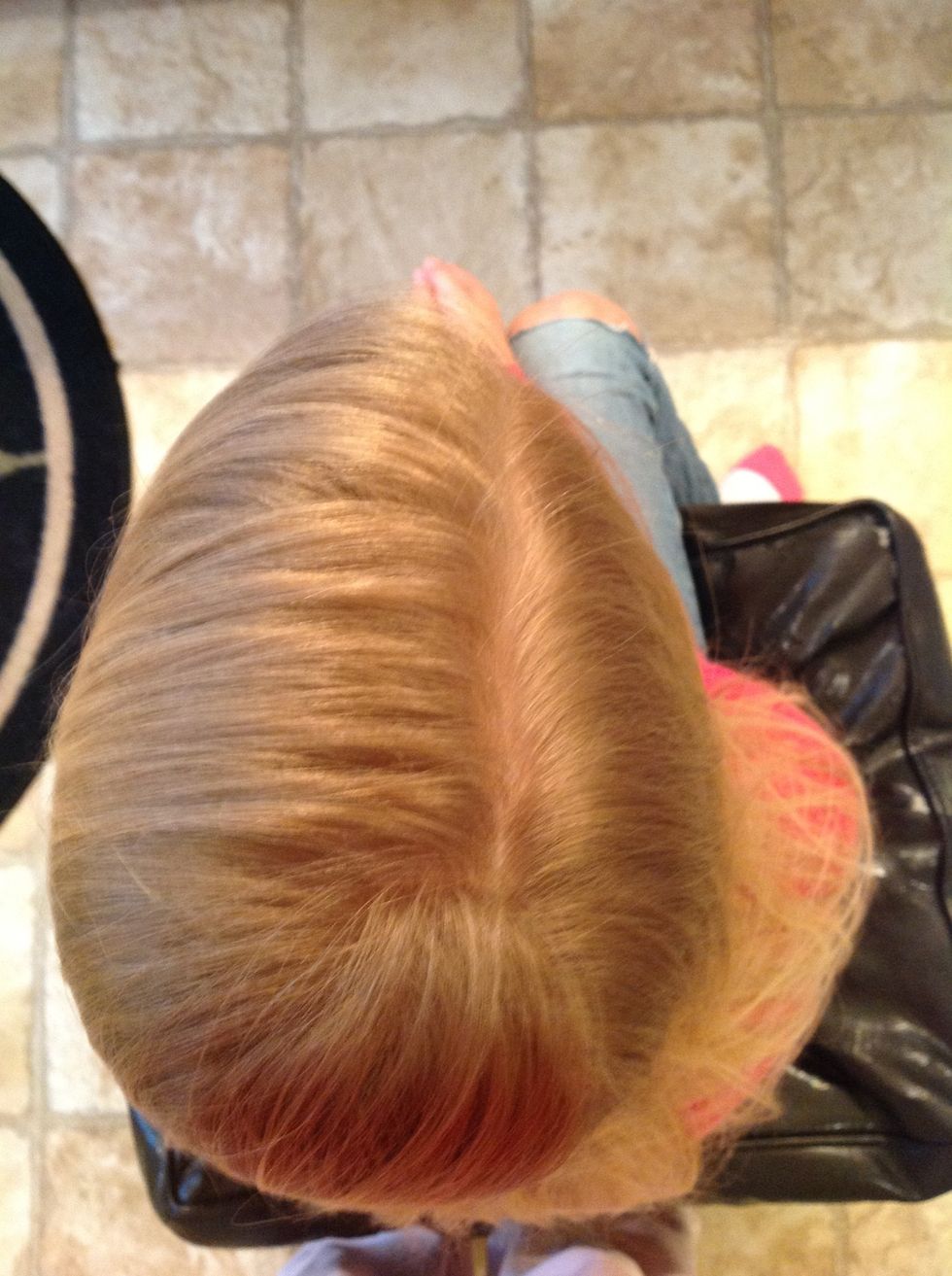 First you start with a side part, on either side.