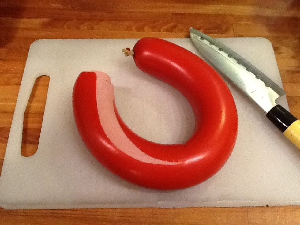 First you take of the skin from the sausage.