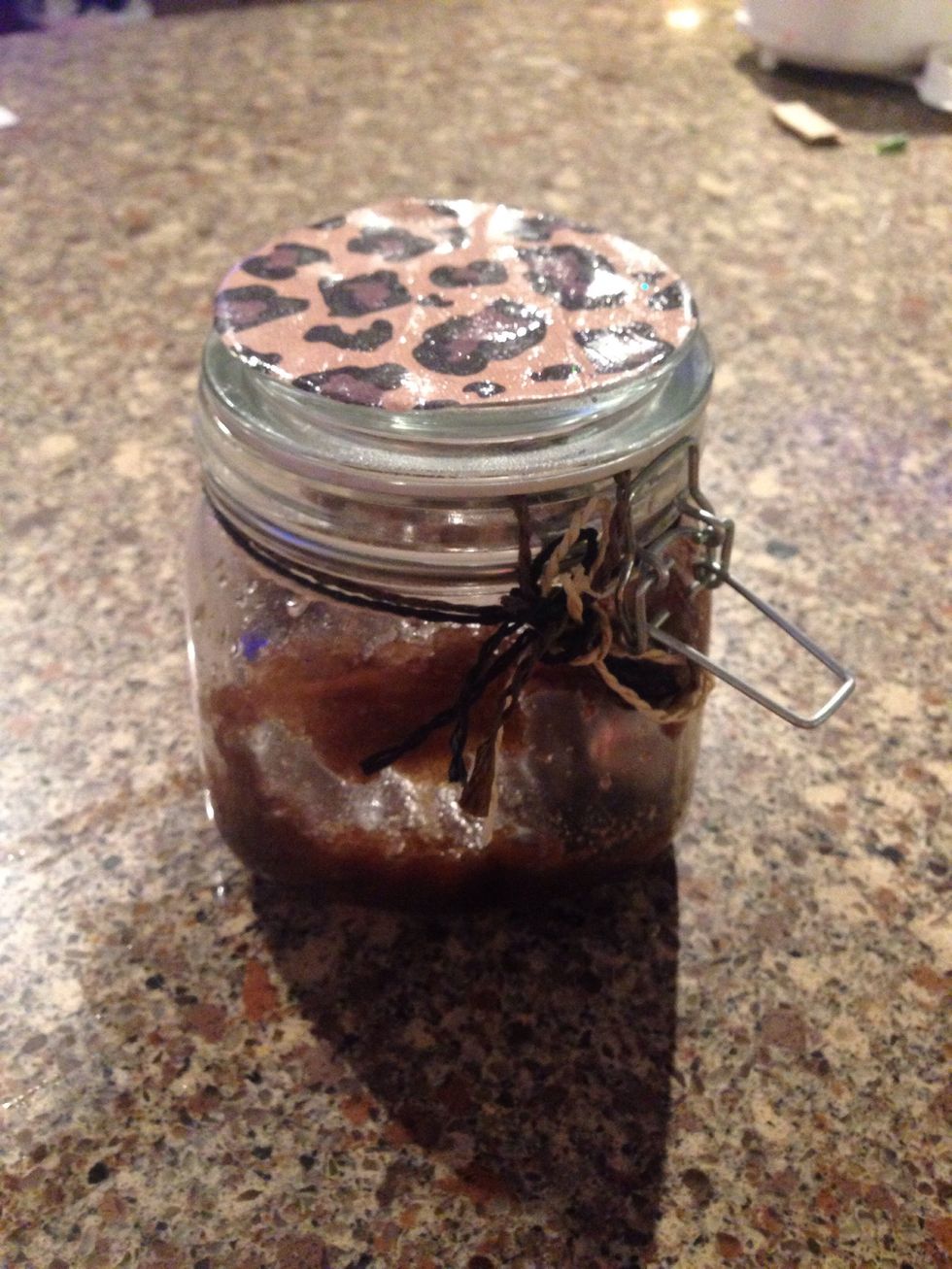 First you want to get in the shower with as warm of water as you can stand. Then get your body scrub, and gently rub it on your legs.