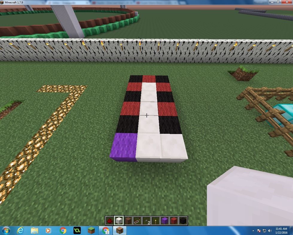 First you want to make the base of this. Get 1 block of Purple Wool and your 6 blocks of Black Wool, 5 blocks of Red Wool and 6 blocks of Quartz. This is a 3 by 5 base too.