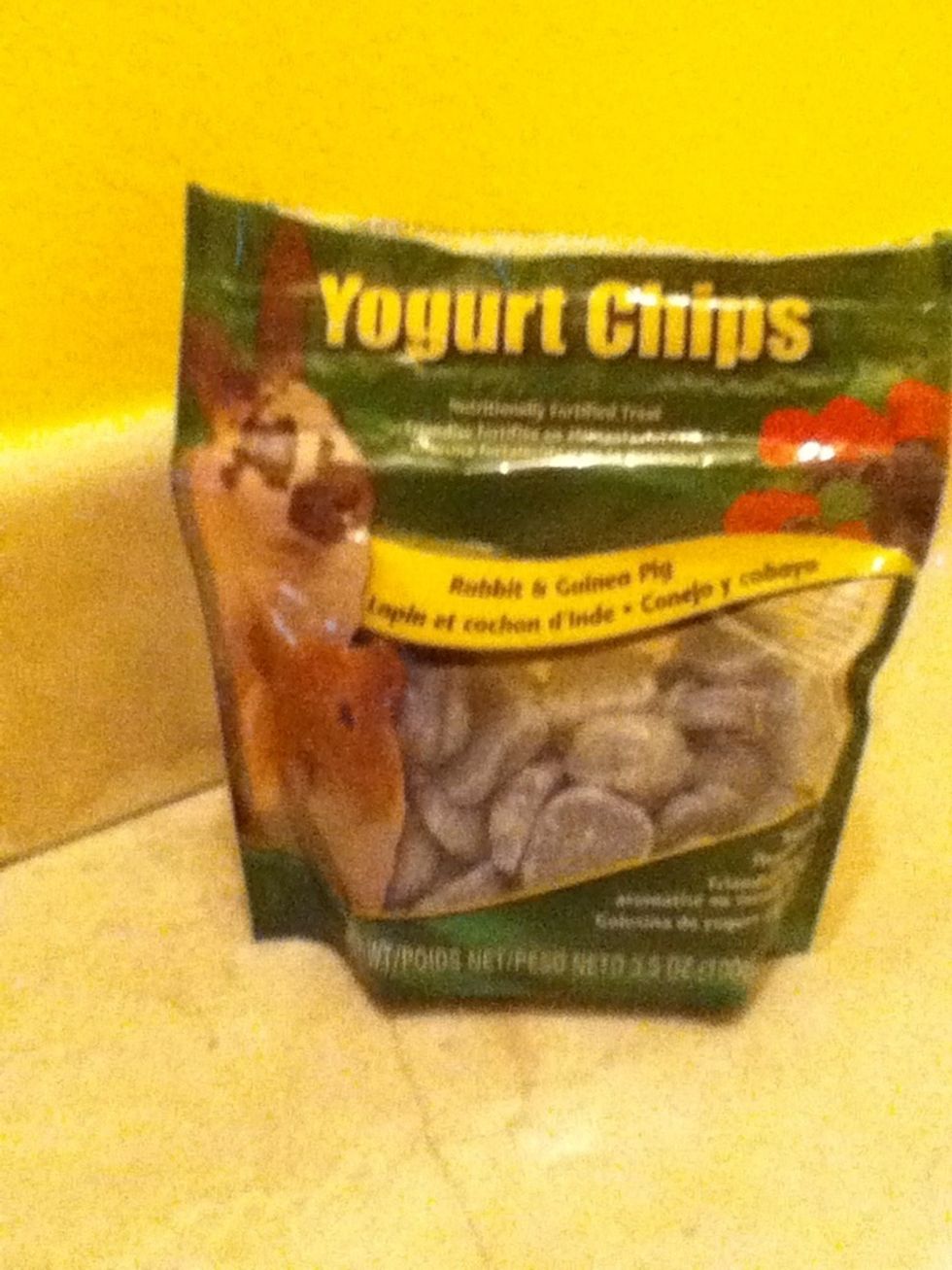 First,you want to take your rabbits favorite treat...my rabbit Thumper loves banana,grapes,and tomato but I'll use yogurt chips for these tricks.