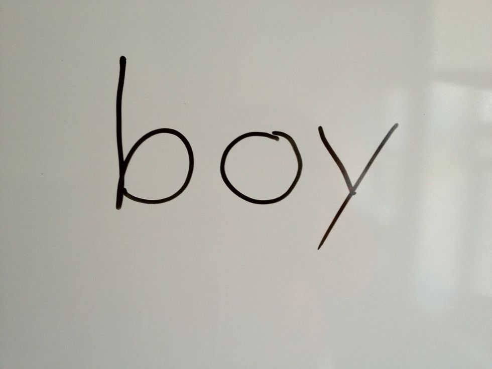 First you write the word "boy".