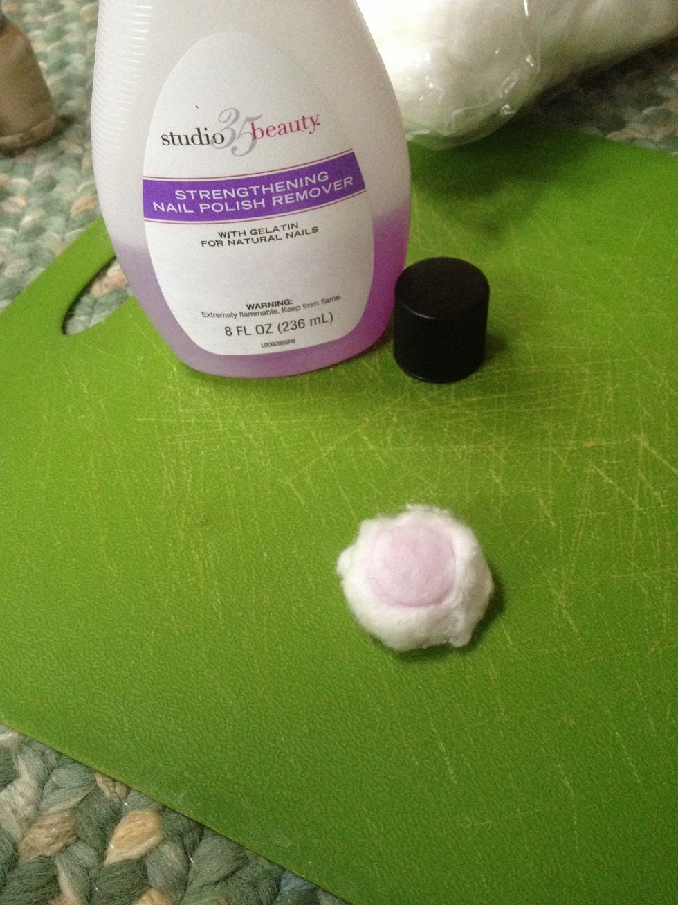 First your going to take your nail polish remover and a cotton ball then your going to take all the rest of your nail polish off