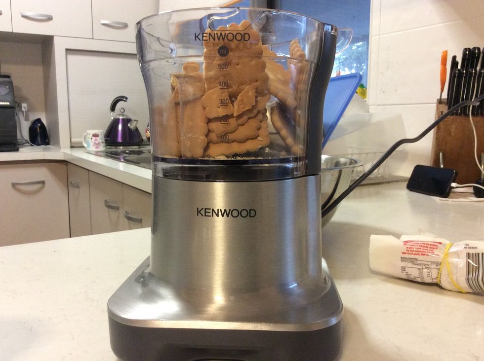 Firstly, break cookies into halves and put them in a food processor (or blender if you don't have a food processor) Repeat this process until all cookies are gone. \ud83c\udf6a