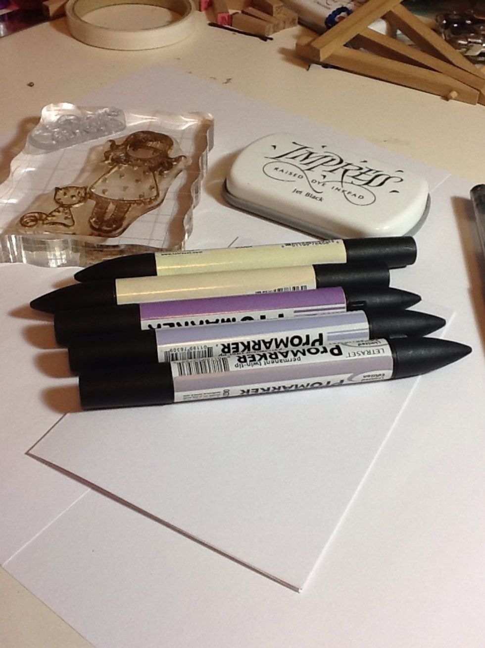 Firstly choose your image, colours and card base (I'm going to use more than the promarkers shown but to give you an idea of what colours I'm using)