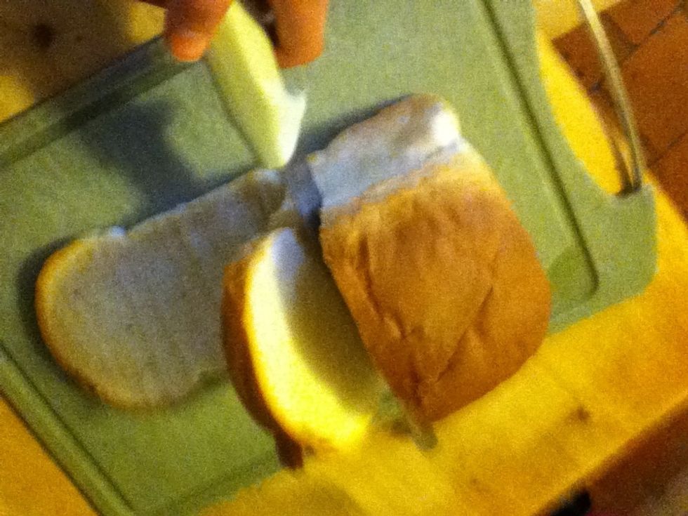 Firstly, cut two slices of bread with your bread knife. Then put to one side.