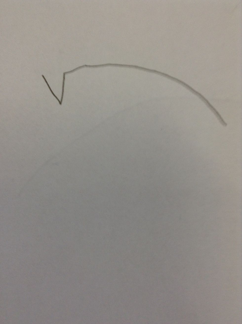 Firstly,draw a slightly oval line with a point on the left of the shape.