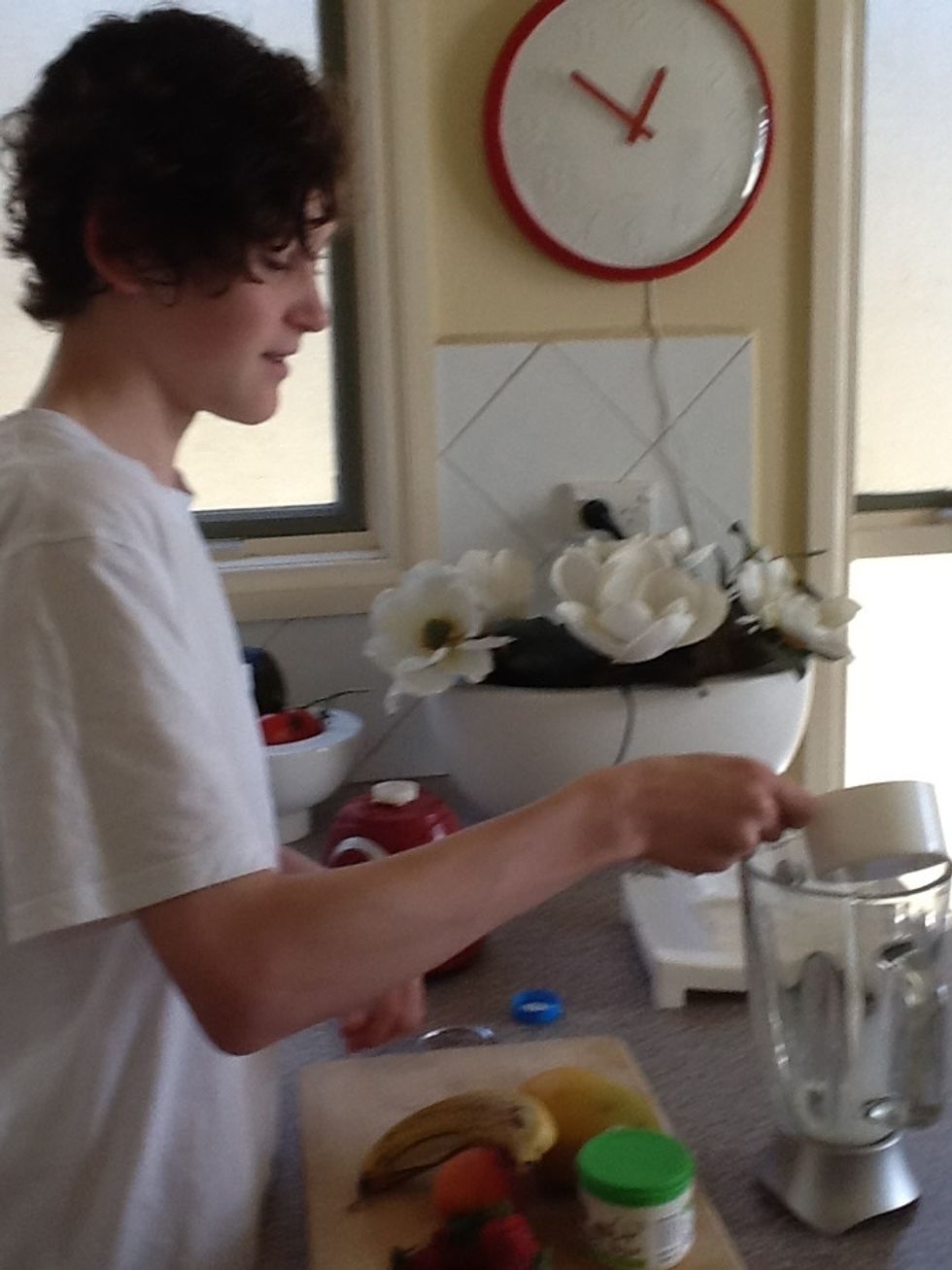 Firstly put 1 cup of milk in the blender.