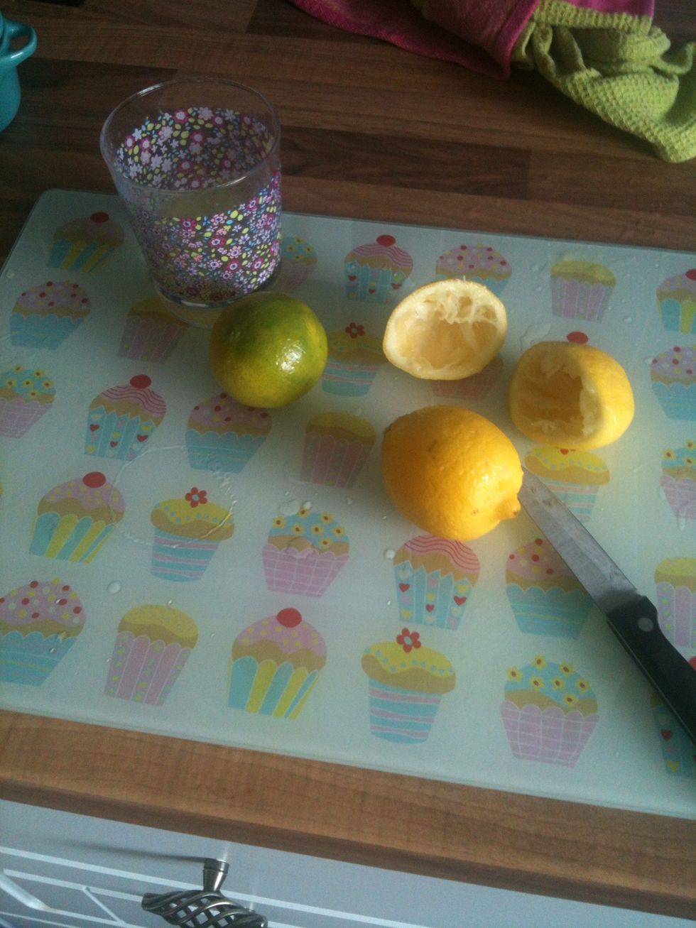 Firstly slice and squeeze your lemons and lime into a glass, I don't bother with a juicer, I just squeeze them by hand! I'll show you the best way to get all the juice when squeezing fruit...