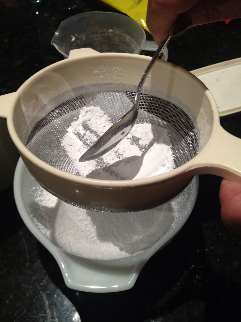 Firstly start by sifting a cup of icing sugar into a bowl