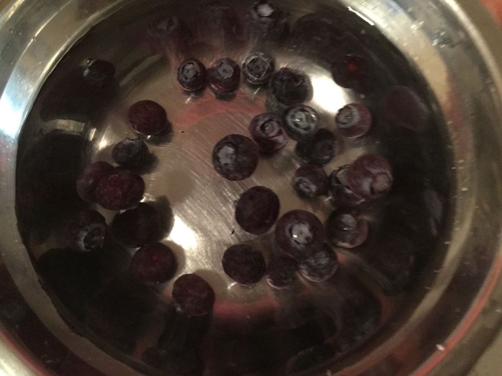 Firstly, wash all the delicious blue berries in a bowl to make sure the blue berries are clean.