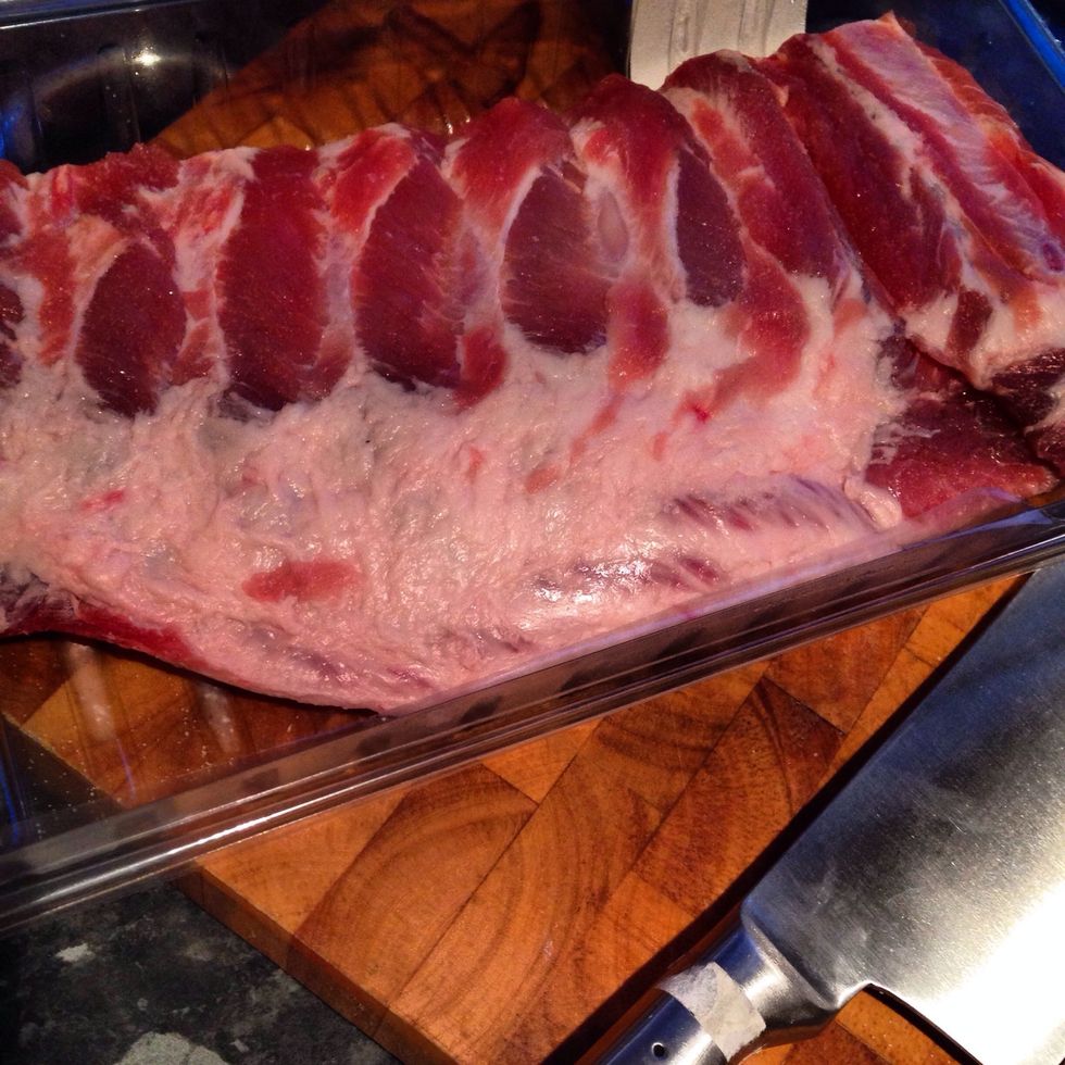 Firstly you're going to need a good rack of ribs, meaty with a good amount of fat. The fat is important to the cooking process as it bastes the meat, keeps it juicy and makes it sticky.