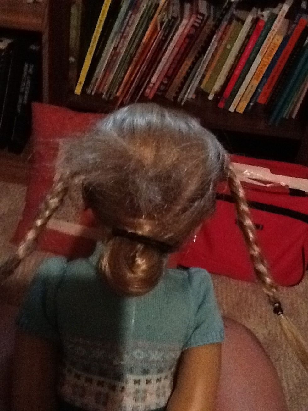 Fishtail braid the two sections all the way down