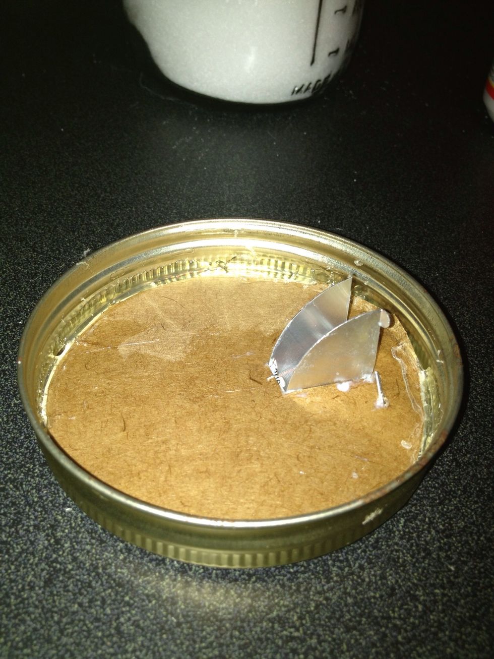 Fit box top into the jar ring and hot glue if you like.