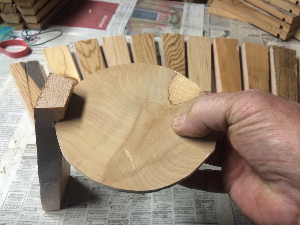 Fit one of the staves in the base and start adding one at a time.