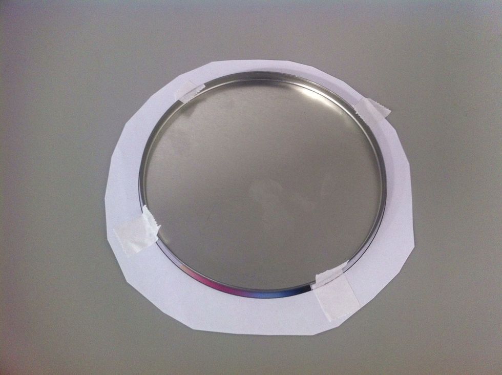 fixar a tampa sobre o transfer com fita crepe