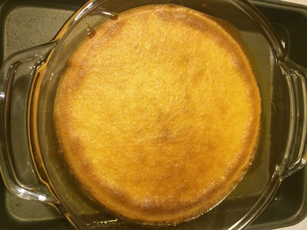 Flan should look something like this. Set aside away from heat source to cool down for about 30-45 min. before flipping the flan. This gives caramel and flan time to cool and set a bit