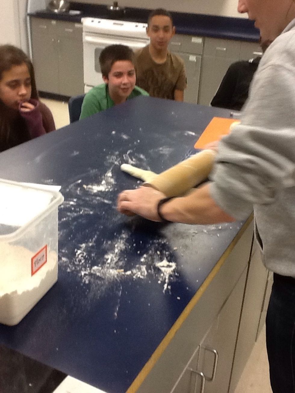 Flat a little bit with a rolling pin