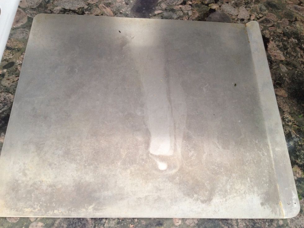 Flat baking sheet without edges works best to circulate heat evenly. Use foil or a light spray to avoid sticking.