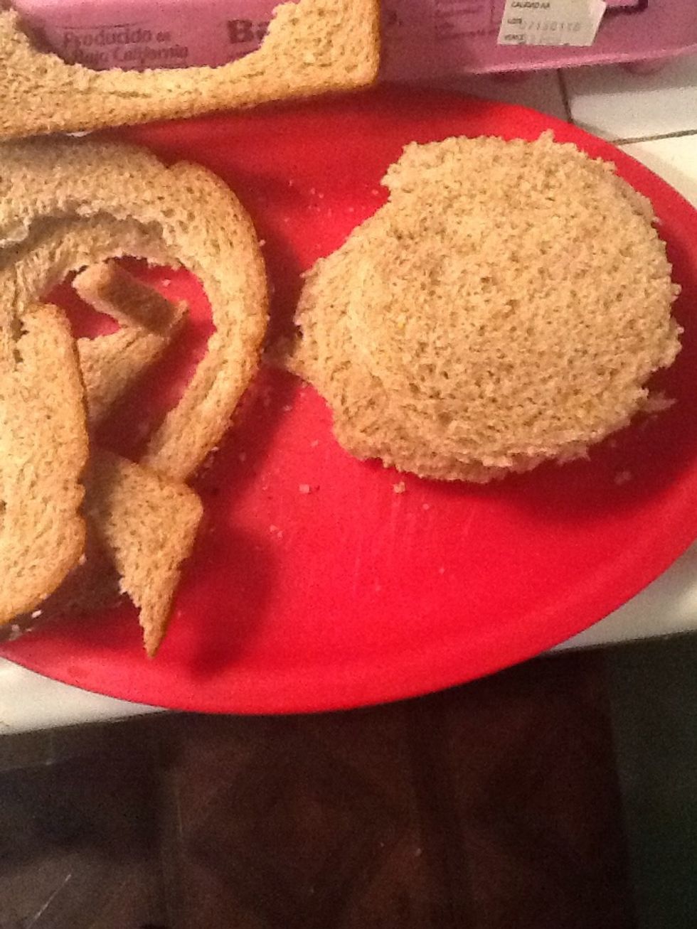 Flatten bread slices with your hands and cut 8 rounds of 4 inches. Then cut each round in half.