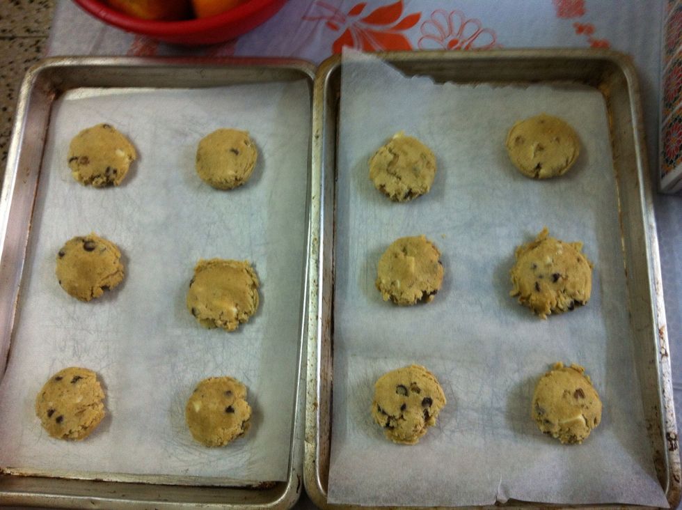 Flatten down slightly and bake for 12-14 minutes. Then cool in the pan for 5 minutes before transfering into a wire rack to cool down completely, although I have to say, I like them warm