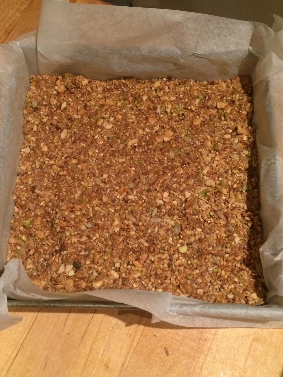 Flatten down the mix. Try to evenly spread the mix while flattening. Place in refrigerator to cool down. About 60mins should be enough time to cool.