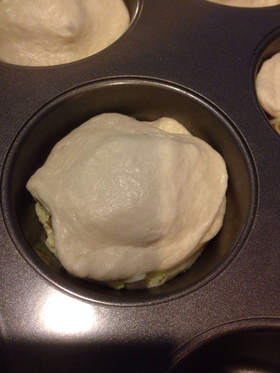 Flatten each half so you can cover each cupcake