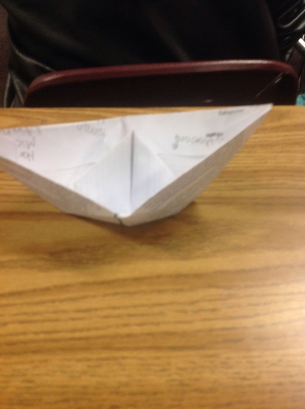 Flatten out the creases and open to finish the boat