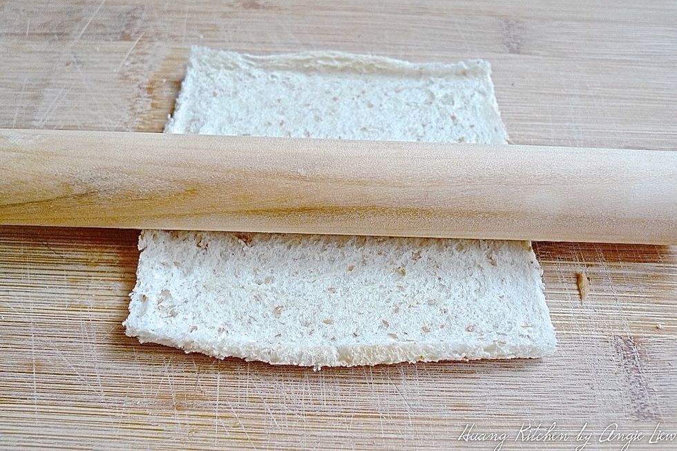 Flatten the bread by rolling out as thin as possible with a rolling pin. If you don't have a rolling pin, use the sides of a tall drinking glass or jar instead.