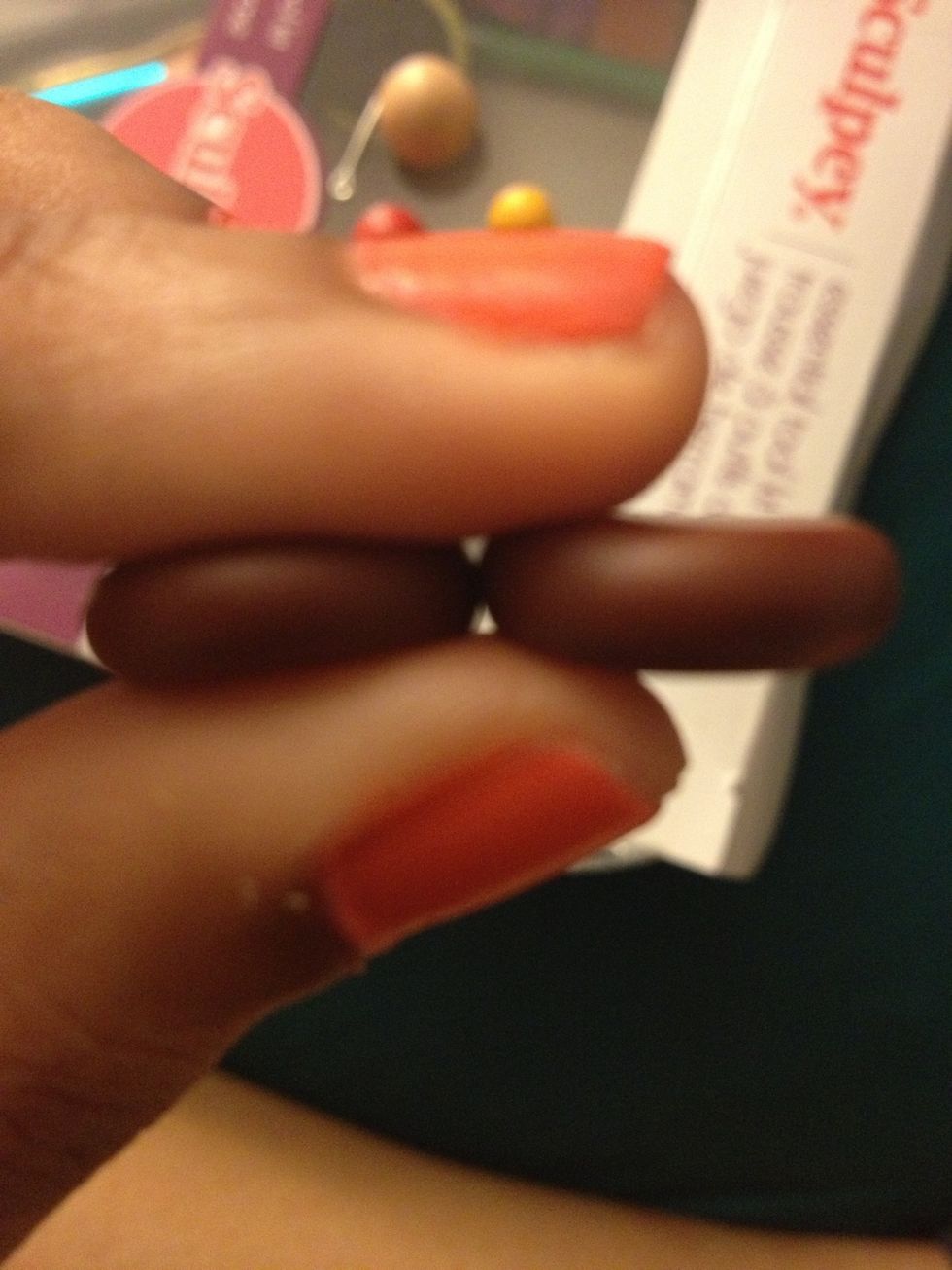 Flatten the circles but keep them pretty thick and in a circle shape.