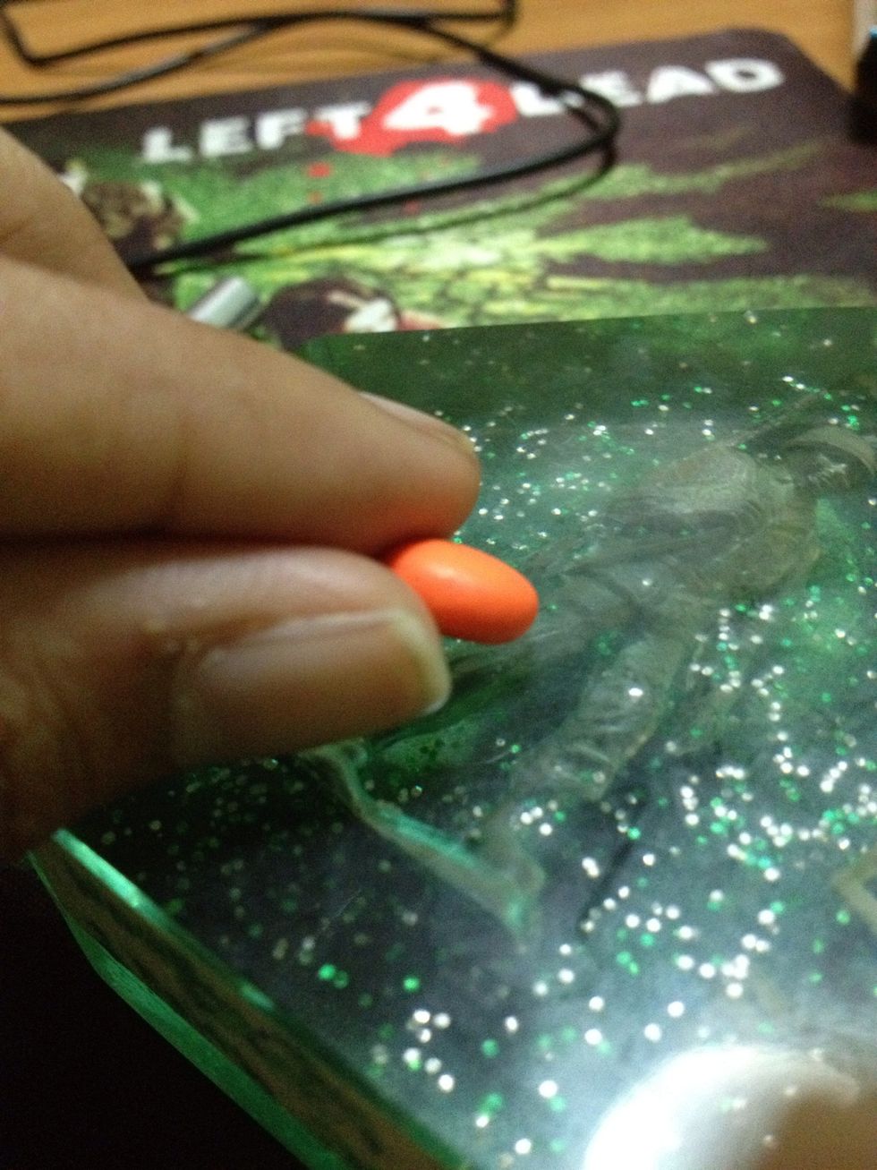 Flatten the edges to that of a M&Ms.