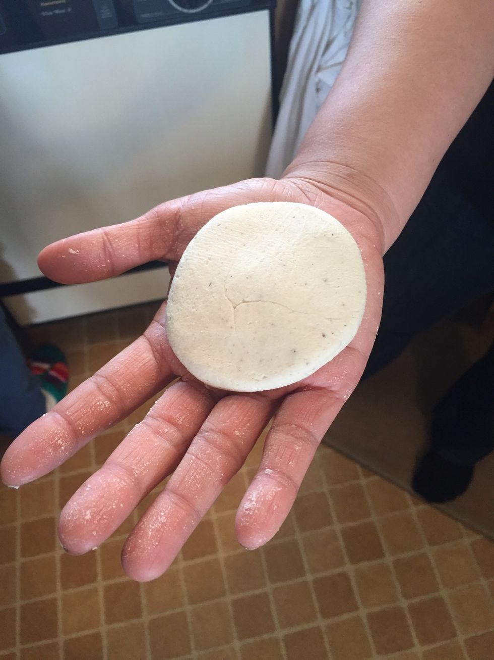 Flatten the masa to Palm size and use a tortilla press to flatten