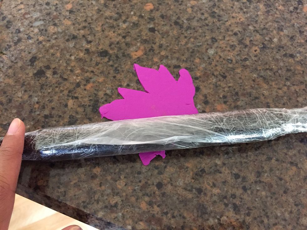 Flatten your polymer clay out with a rolling pin MAKE SURE YOU COVER THE ROLLING PIN WITH PLASTIC WARP