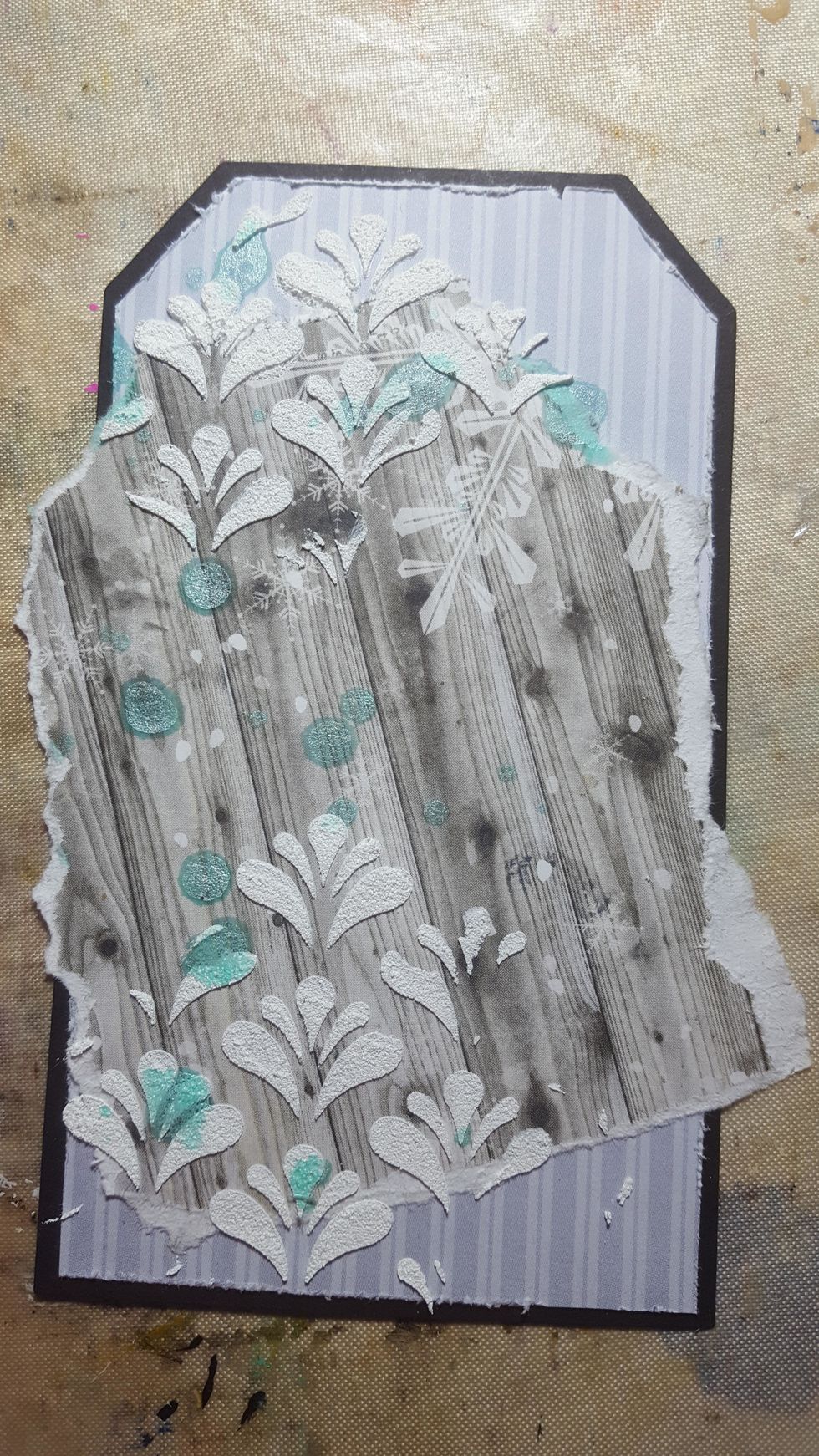 Flick a few drops of Prima ColorBloom Soft Teal mist over the tag.