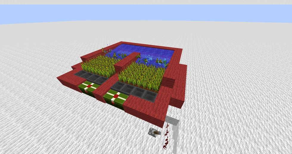 Flick the lever and watch the seeds and wheat flow into the hoppers.