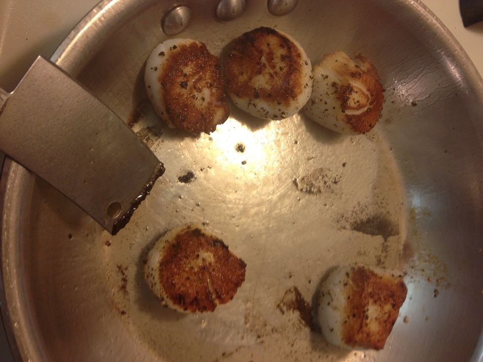 Flip after 90 seconds.                                    Cook for another minute and a half            then remove scallops from pan.