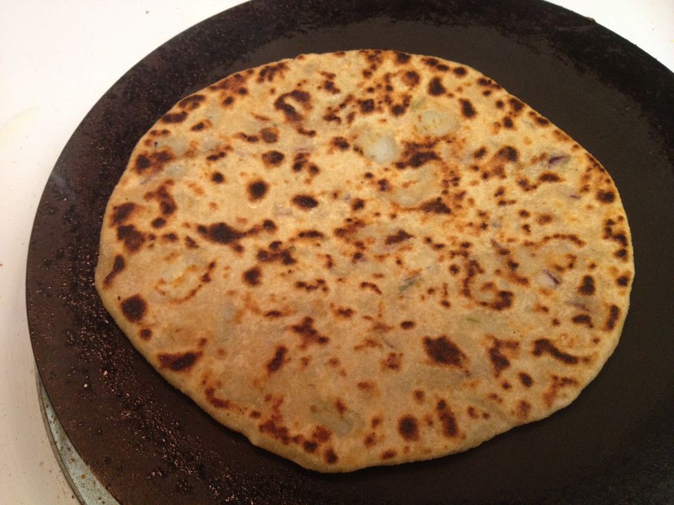 Flip again and its ready when both sides look like this. Enjoy this with a spat of butter on the top and plain yogurt on the side.