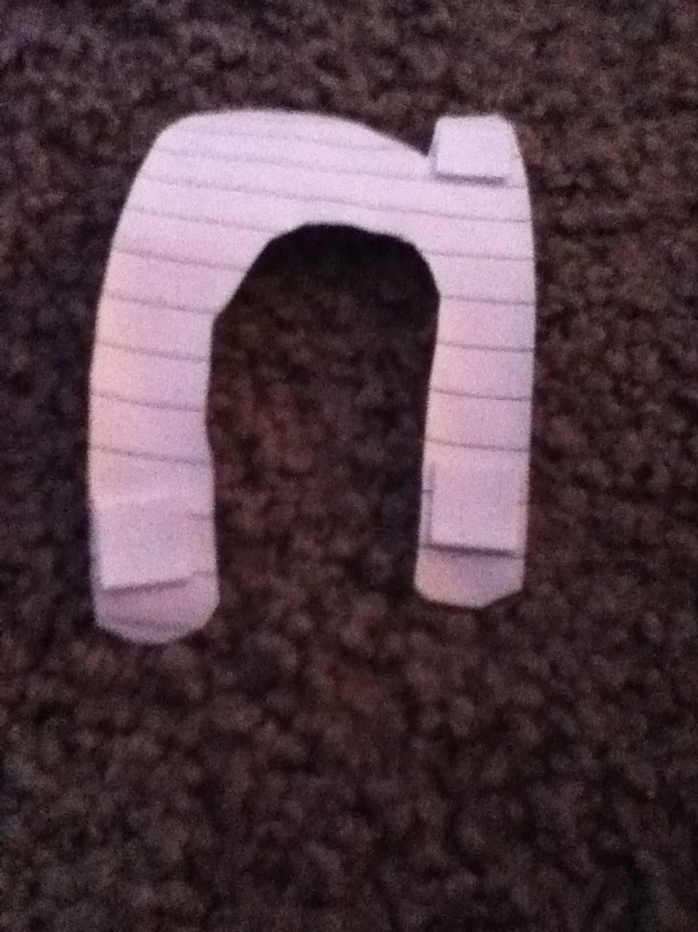 Flip and put adhesive foam squares, double-sided tape or tape doughnuts on the back of each letter!