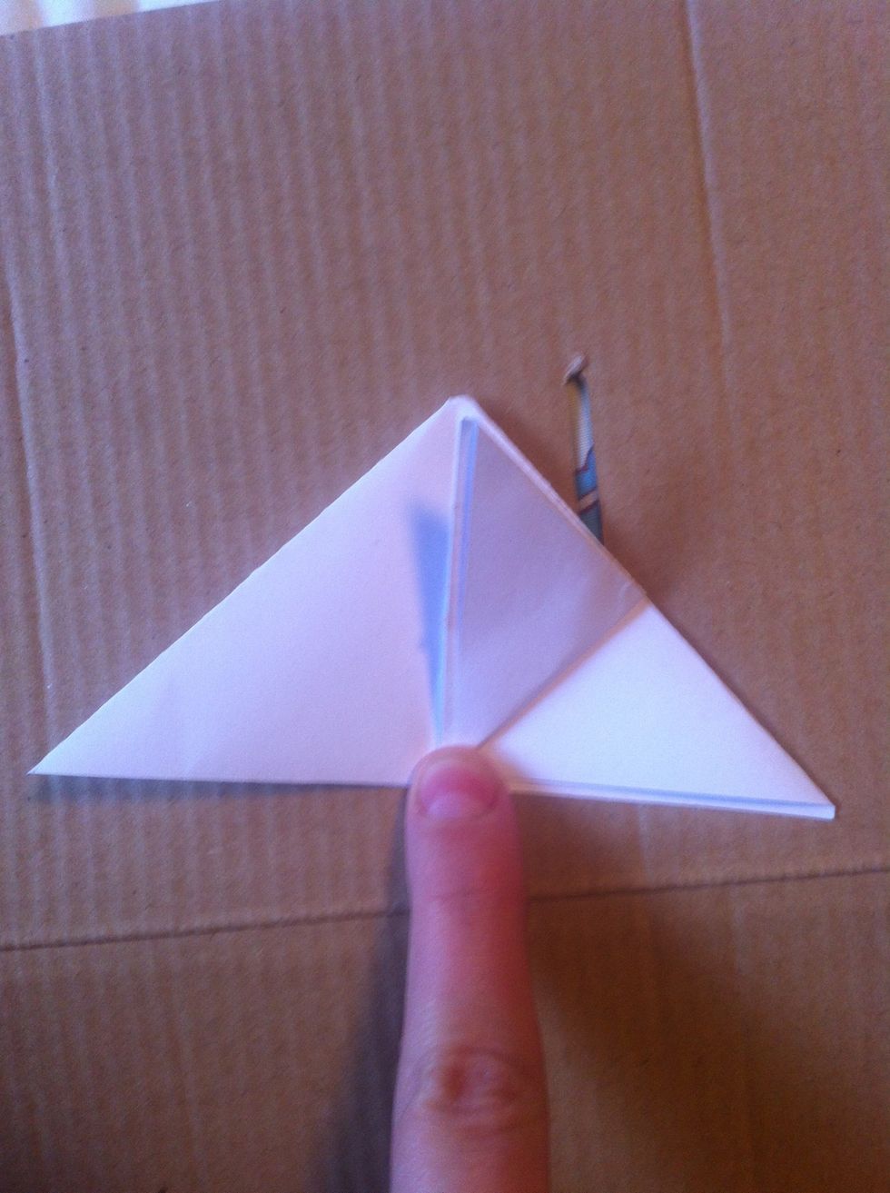 Flip bottom corners to top of triangle.