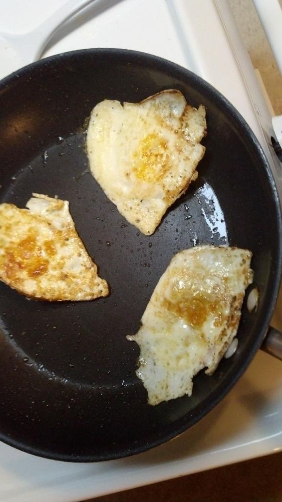 Flip eggs for a few seconds (less than 5) to seal in the yolk.
