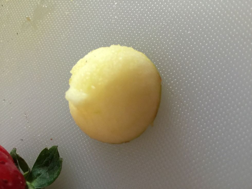Flip it and make sure that the inside part of the Apple is out when you push in the apple into the strawberry