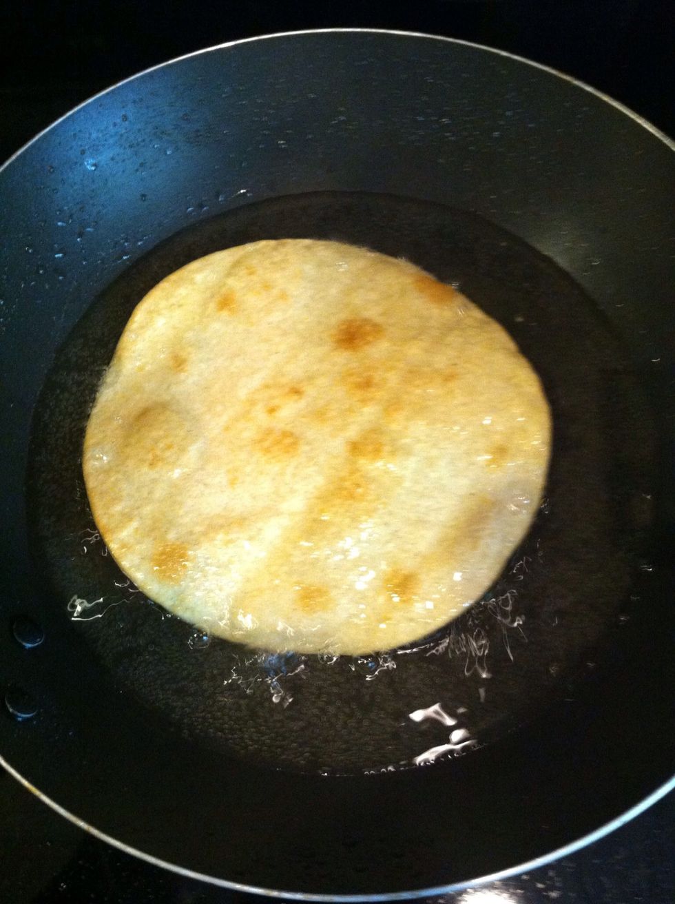Flip it around. Cook other side until golden.
