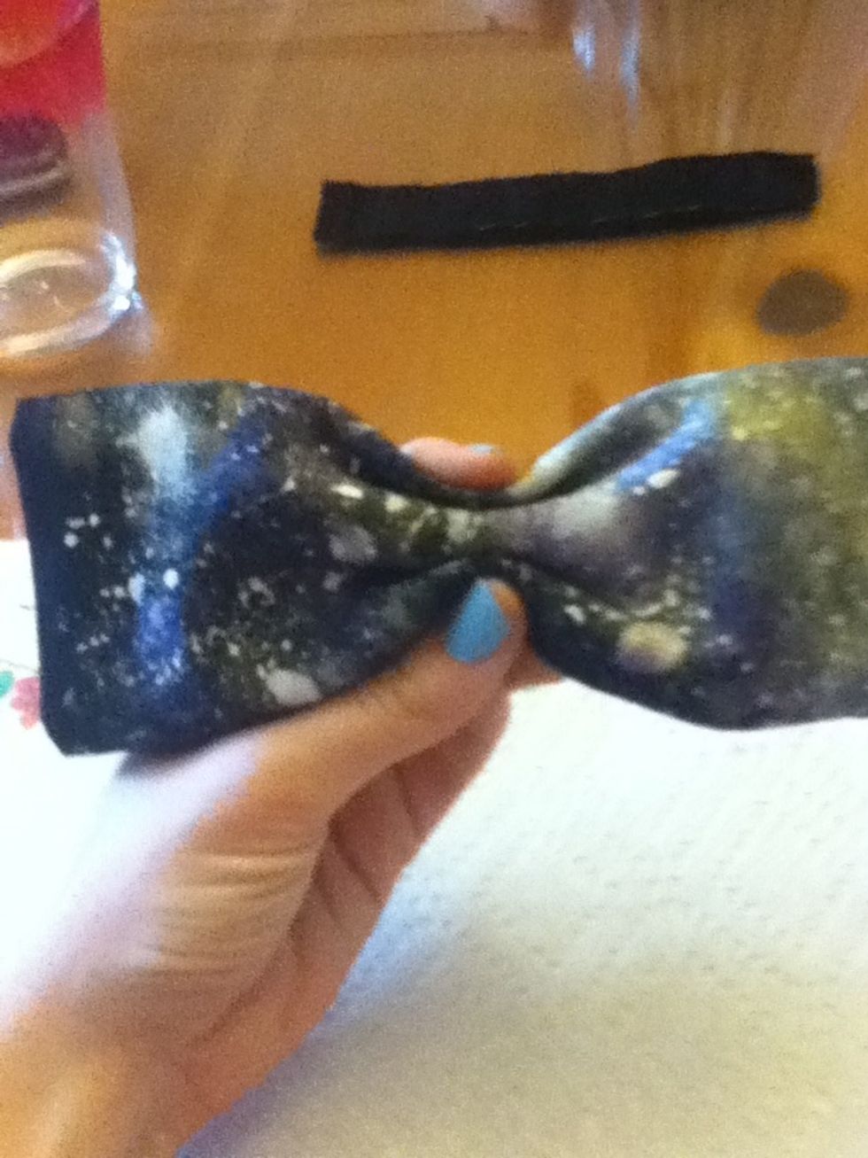 Flip it back over and mess with the shape to like like a bow how you like.