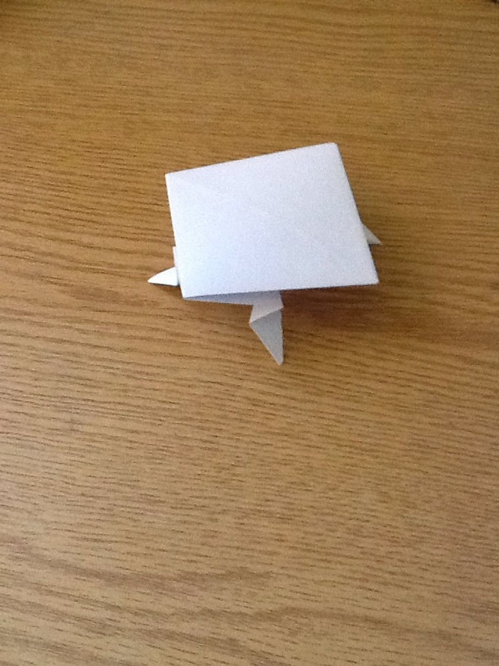 Flip it on its "tommy".. Now, how about that?! You see a diamond on for legs.. I will choose this side as the head with its two frontal legs.. You will see what I mean..